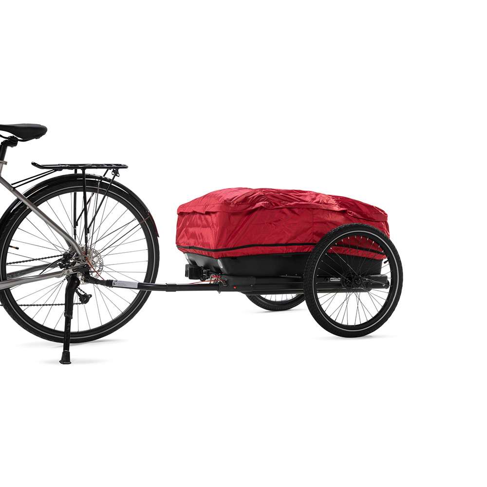 Sykkeltilhenger Nordic Cab med rødt trekk og store hjul. Foto