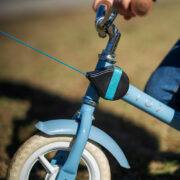 kidreel in action on blue bike