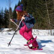 Girl with pink snowshoes in the snow | Crescent Moon