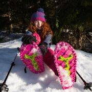 Girl with snowshoes in the snow | pink | Crescent Moon